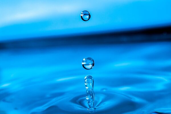 clear water with 2 drops floating